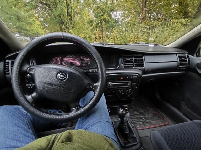 Синій Опель Вектра, об'ємом двигуна 2 л та пробігом 292 тис. км за 1495 $, фото 6 на Automoto.ua