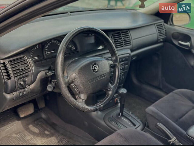 Синій Опель Вектра, об'ємом двигуна 1.6 л та пробігом 318 тис. км за 2900 $, фото 3 на Automoto.ua