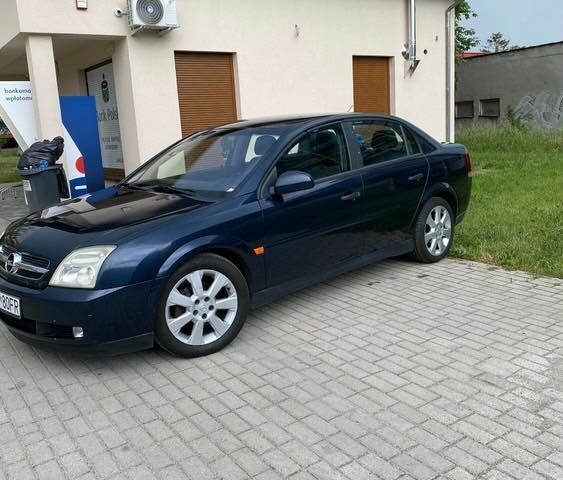 Синий Опель Вектра, объемом двигателя 2.2 л и пробегом 310 тыс. км за 2400 $, фото 11 на Automoto.ua