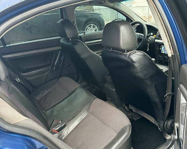 Синий Опель Вектра, объемом двигателя 2.2 л и пробегом 430 тыс. км за 3200 $, фото 4 на Automoto.ua