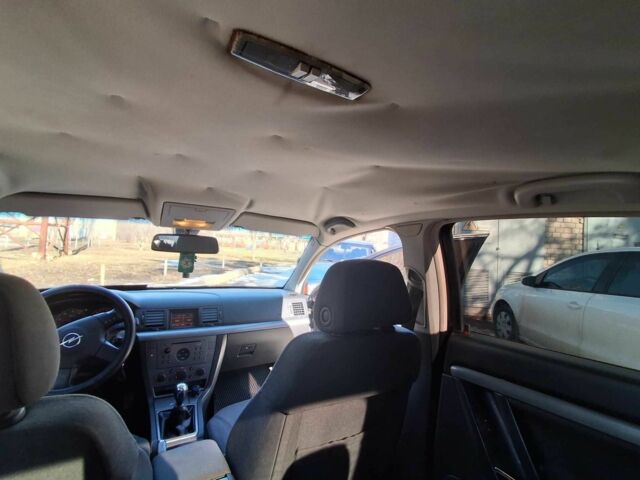 Синий Опель Вектра, объемом двигателя 2 л и пробегом 370 тыс. км за 1950 $, фото 10 на Automoto.ua