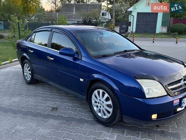 Синий Опель Вектра, объемом двигателя 2.2 л и пробегом 348 тыс. км за 3900 $, фото 11 на Automoto.ua