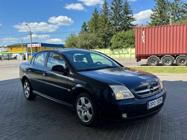 Синий Опель Вектра, объемом двигателя 2.2 л и пробегом 230 тыс. км за 1750 $, фото 5 на Automoto.ua
