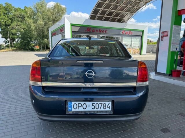 Синий Опель Вектра, объемом двигателя 2.2 л и пробегом 230 тыс. км за 1750 $, фото 2 на Automoto.ua