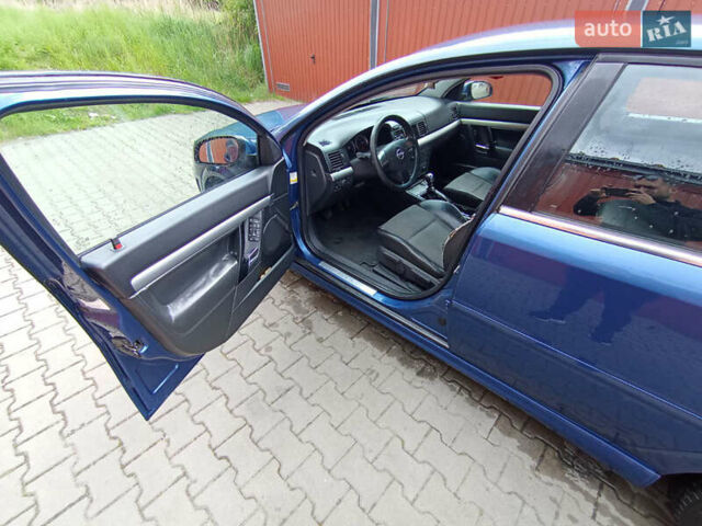 Синий Опель Вектра, объемом двигателя 2.2 л и пробегом 260 тыс. км за 3700 $, фото 6 на Automoto.ua