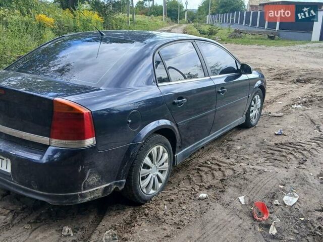 Синий Опель Вектра, объемом двигателя 2.2 л и пробегом 300 тыс. км за 3000 $, фото 1 на Automoto.ua