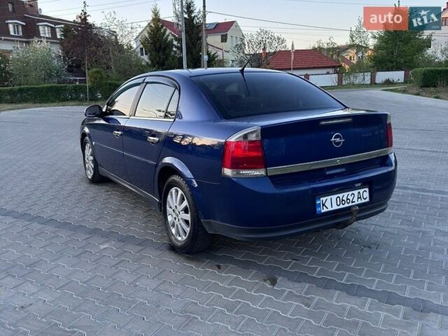Синий Опель Вектра, объемом двигателя 2.2 л и пробегом 348 тыс. км за 3900 $, фото 6 на Automoto.ua
