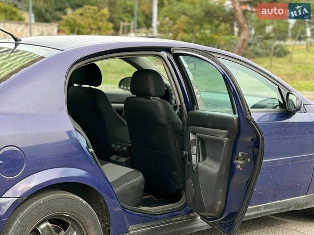 Синій Опель Вектра, об'ємом двигуна 2 л та пробігом 295 тис. км за 2300 $, фото 11 на Automoto.ua