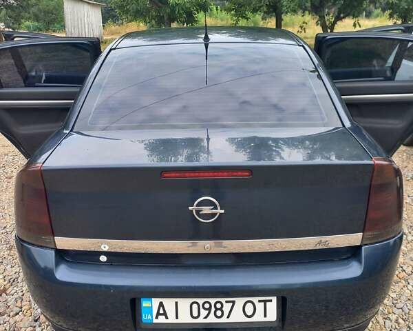 Синий Опель Вектра, объемом двигателя 2.17 л и пробегом 330 тыс. км за 3900 $, фото 11 на Automoto.ua