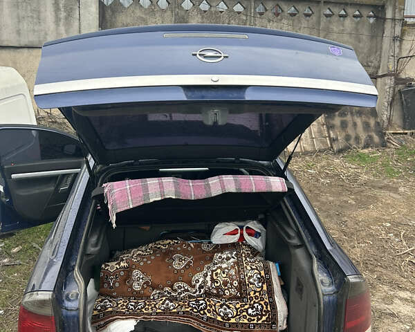 Синий Опель Вектра, объемом двигателя 1.8 л и пробегом 200 тыс. км за 4999 $, фото 4 на Automoto.ua