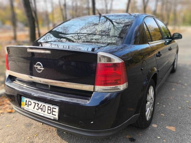 Синий Опель Вектра, объемом двигателя 2.2 л и пробегом 257 тыс. км за 5800 $, фото 4 на Automoto.ua