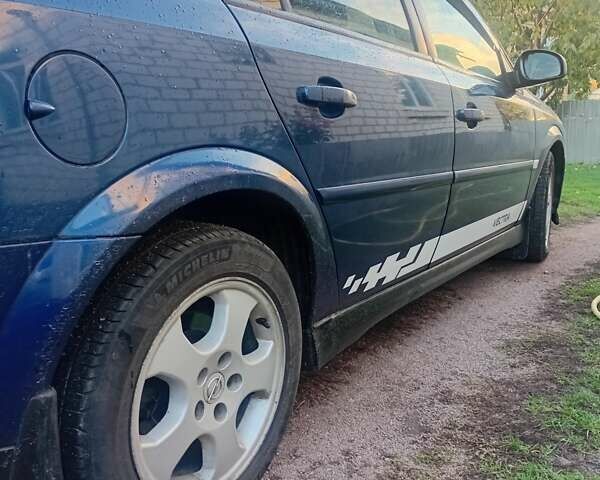 Синій Опель Вектра, об'ємом двигуна 2.2 л та пробігом 301 тис. км за 4300 $, фото 3 на Automoto.ua