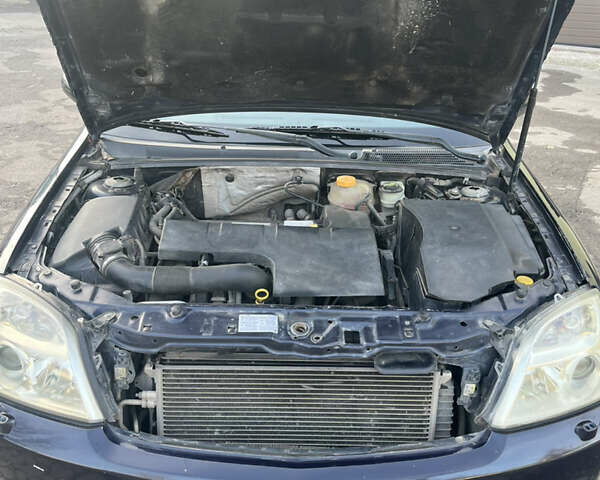 Синий Опель Вектра, объемом двигателя 2.2 л и пробегом 260 тыс. км за 4000 $, фото 11 на Automoto.ua