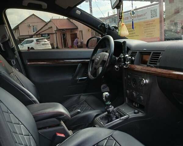 Синий Опель Вектра, объемом двигателя 2.2 л и пробегом 260 тыс. км за 4099 $, фото 6 на Automoto.ua