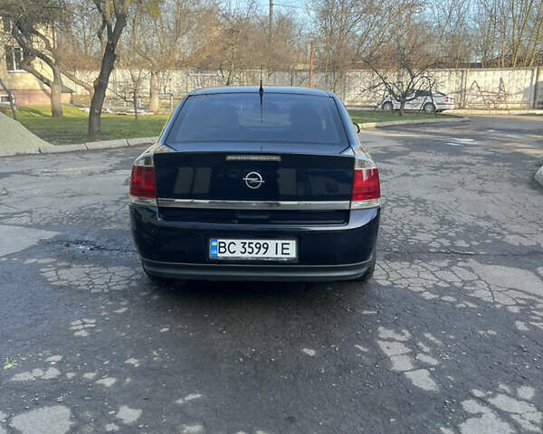 Синий Опель Вектра, объемом двигателя 2.2 л и пробегом 260 тыс. км за 4000 $, фото 4 на Automoto.ua