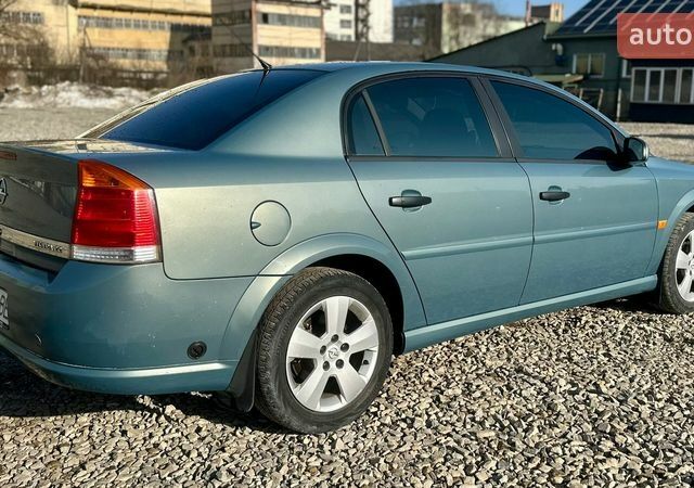 Синий Опель Вектра, объемом двигателя 2.21 л и пробегом 240 тыс. км за 4500 $, фото 4 на Automoto.ua