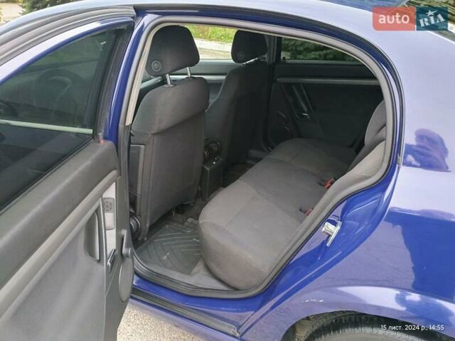 Синий Опель Вектра, объемом двигателя 1.91 л и пробегом 205 тыс. км за 4650 $, фото 14 на Automoto.ua