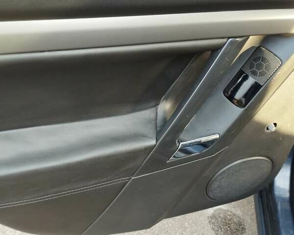 Синій Опель Вектра, об'ємом двигуна 1.8 л та пробігом 325 тис. км за 3999 $, фото 29 на Automoto.ua
