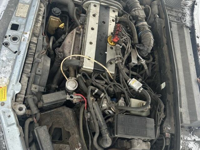 Синій Опель Вектра, об'ємом двигуна 1.8 л та пробігом 300 тис. км за 1001 $, фото 5 на Automoto.ua