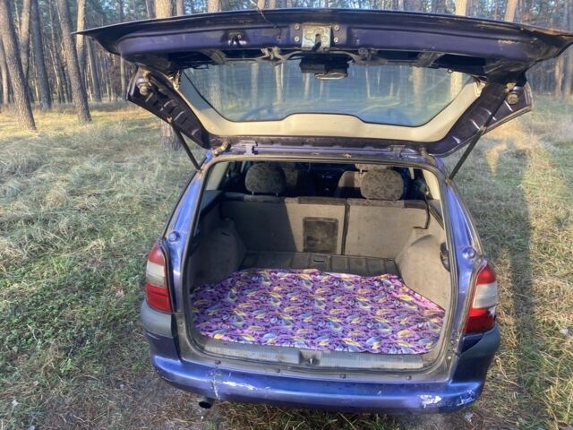 Синий Опель Вектра, объемом двигателя 1.8 л и пробегом 300 тыс. км за 1100 $, фото 5 на Automoto.ua