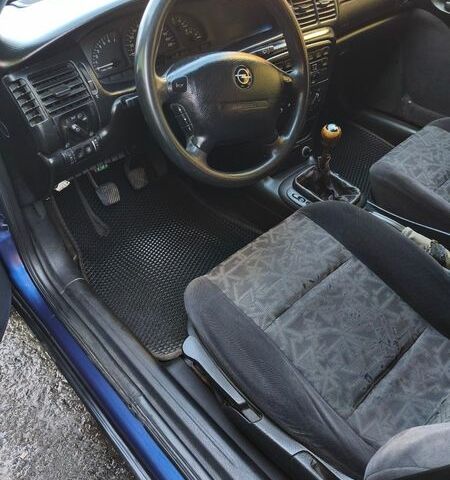 Синій Опель Вектра, об'ємом двигуна 1.8 л та пробігом 323 тис. км за 2500 $, фото 14 на Automoto.ua