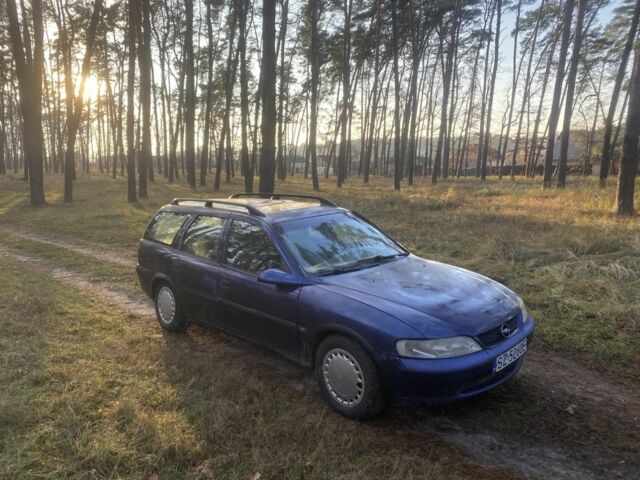 Синий Опель Вектра, объемом двигателя 1.8 л и пробегом 300 тыс. км за 1100 $, фото 4 на Automoto.ua