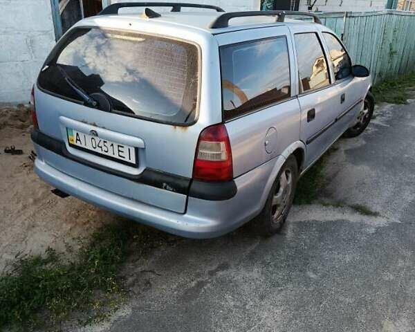 Синий Опель Вектра, объемом двигателя 1.8 л и пробегом 305 тыс. км за 1500 $, фото 1 на Automoto.ua