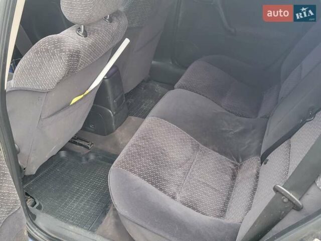 Синій Опель Вектра, об'ємом двигуна 1.8 л та пробігом 350 тис. км за 2299 $, фото 12 на Automoto.ua