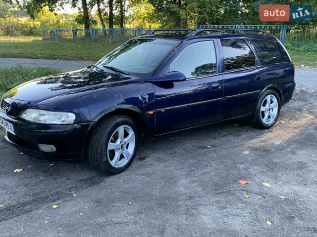 Синий Опель Вектра, объемом двигателя 2 л и пробегом 300 тыс. км за 1500 $, фото 5 на Automoto.ua