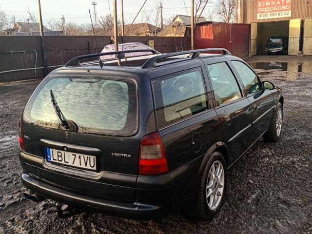 Синій Опель Вектра, об'ємом двигуна 2 л та пробігом 400 тис. км за 1276 $, фото 4 на Automoto.ua