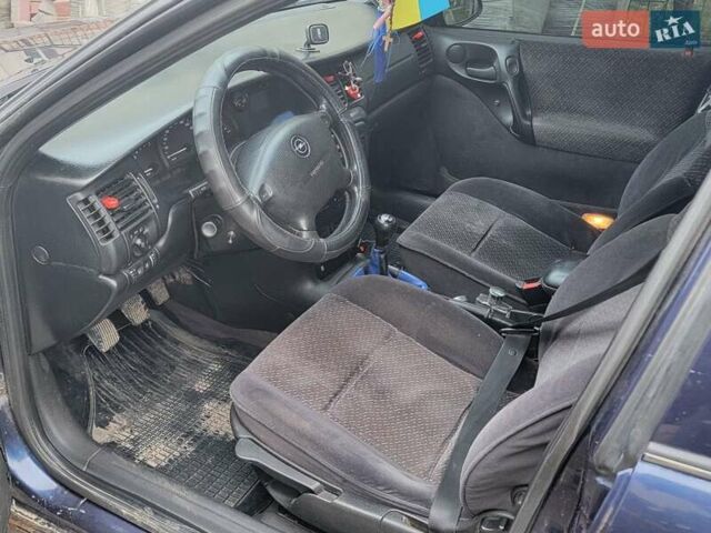 Синий Опель Вектра, объемом двигателя 1.8 л и пробегом 350 тыс. км за 2299 $, фото 11 на Automoto.ua