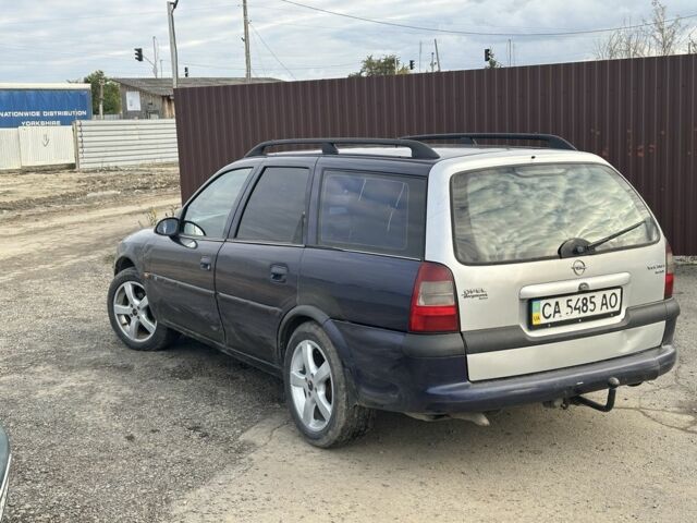 Синий Опель Вектра, объемом двигателя 0 л и пробегом 200 тыс. км за 1350 $, фото 3 на Automoto.ua