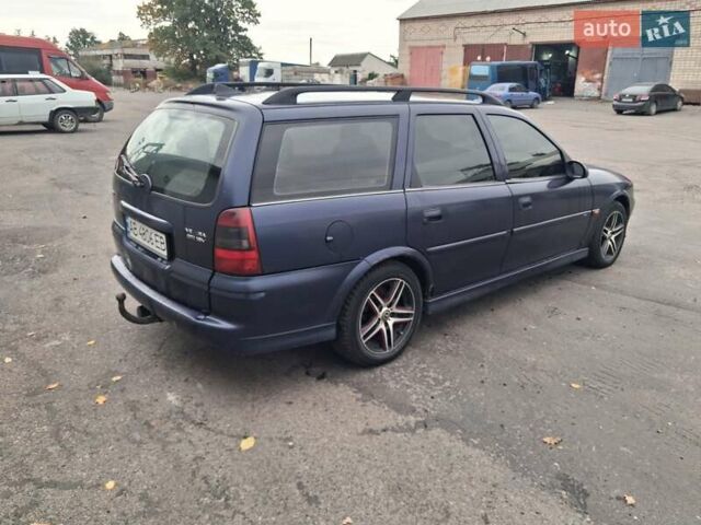 Синій Опель Вектра, об'ємом двигуна 2 л та пробігом 400 тис. км за 2300 $, фото 5 на Automoto.ua