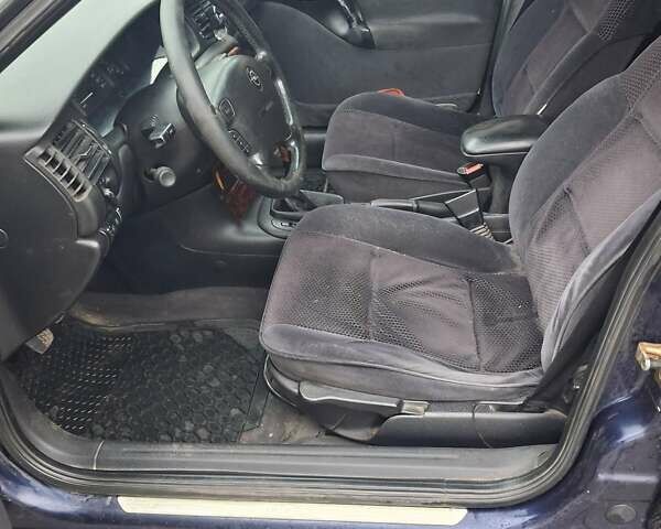 Синій Опель Вектра, об'ємом двигуна 2 л та пробігом 400 тис. км за 2300 $, фото 16 на Automoto.ua