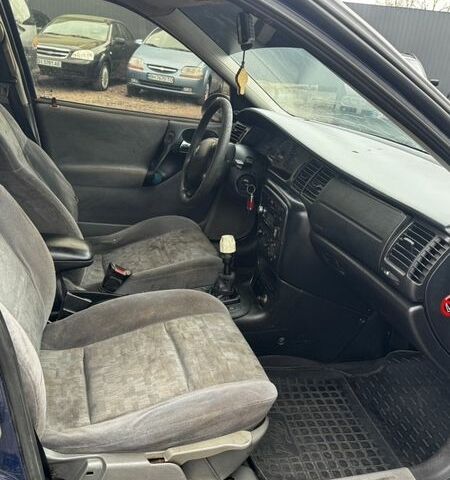 Синий Опель Вектра, объемом двигателя 1.8 л и пробегом 185 тыс. км за 2100 $, фото 7 на Automoto.ua