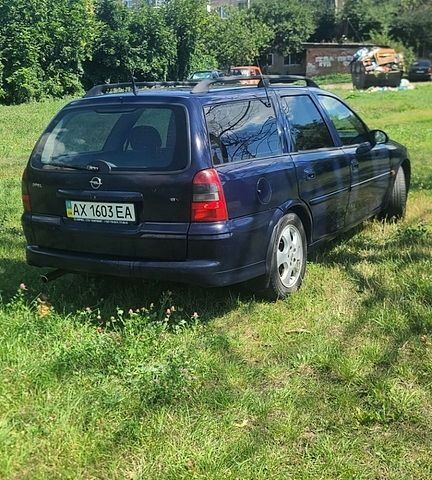 Синій Опель Вектра, об'ємом двигуна 2 л та пробігом 340 тис. км за 1550 $, фото 3 на Automoto.ua