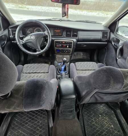 Синий Опель Вектра, объемом двигателя 1.8 л и пробегом 280 тыс. км за 2200 $, фото 9 на Automoto.ua