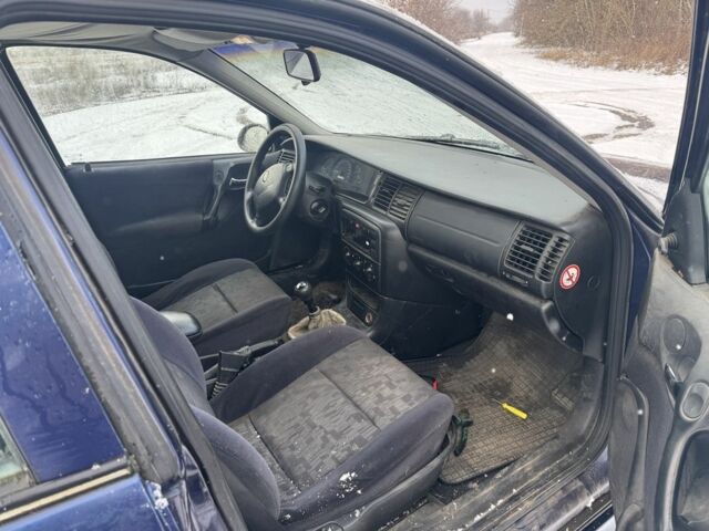 Синій Опель Вектра, об'ємом двигуна 1.6 л та пробігом 200 тис. км за 799 $, фото 6 на Automoto.ua