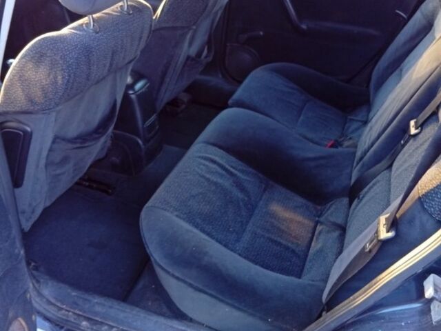 Синий Опель Вектра, объемом двигателя 2 л и пробегом 300 тыс. км за 750 $, фото 6 на Automoto.ua