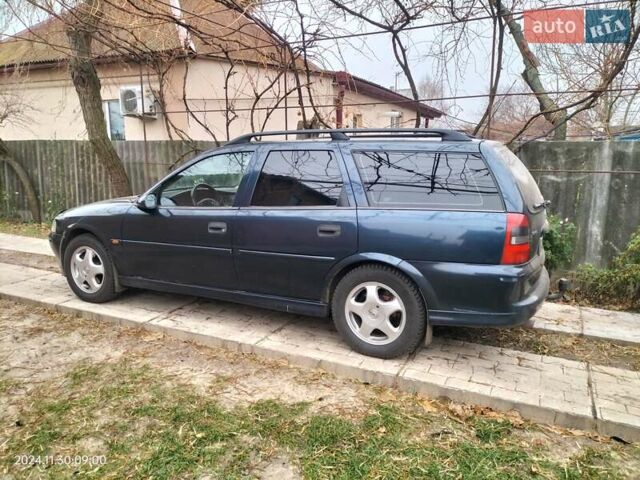 Синий Опель Вектра, объемом двигателя 2 л и пробегом 294 тыс. км за 4300 $, фото 1 на Automoto.ua