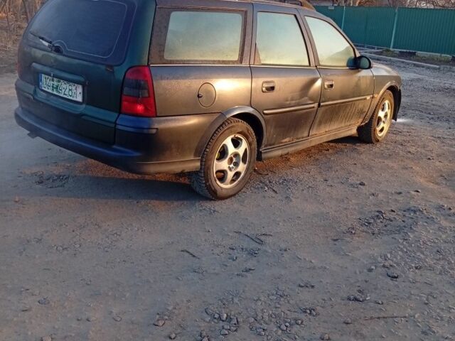 Синий Опель Вектра, объемом двигателя 2 л и пробегом 300 тыс. км за 750 $, фото 1 на Automoto.ua