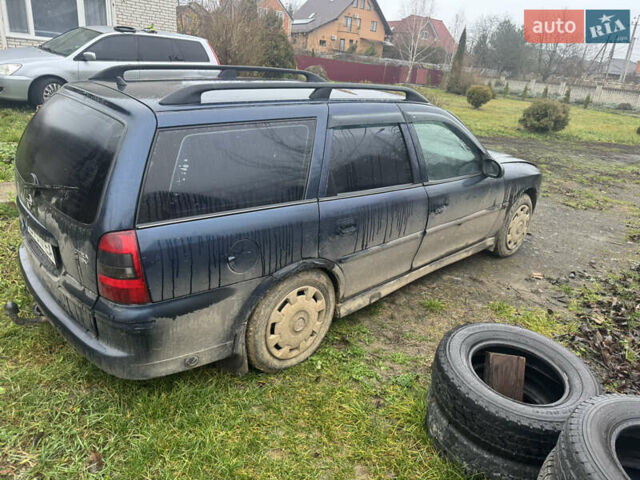 Синий Опель Вектра, объемом двигателя 1.8 л и пробегом 223 тыс. км за 750 $, фото 4 на Automoto.ua