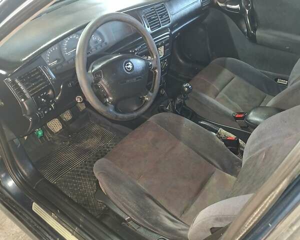 Синій Опель Вектра, об'ємом двигуна 1.8 л та пробігом 335 тис. км за 1750 $, фото 9 на Automoto.ua