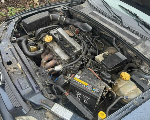 Синий Опель Вектра, объемом двигателя 1.8 л и пробегом 223 тыс. км за 750 $, фото 5 на Automoto.ua