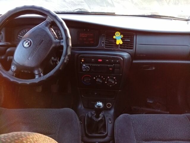 Синий Опель Вектра, объемом двигателя 2 л и пробегом 300 тыс. км за 750 $, фото 5 на Automoto.ua