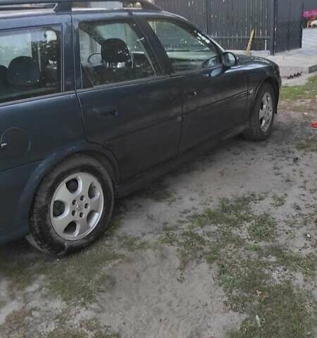 Синій Опель Вектра, об'ємом двигуна 1.8 л та пробігом 228 тис. км за 2919 $, фото 5 на Automoto.ua