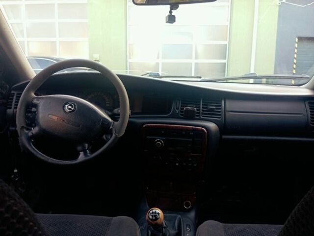 Синий Опель Вектра, объемом двигателя 2.2 л и пробегом 377 тыс. км за 1500 $, фото 9 на Automoto.ua