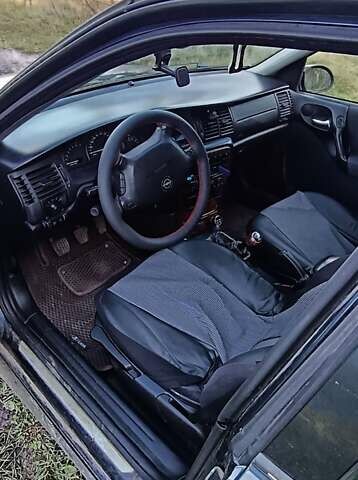 Синій Опель Вектра, об'ємом двигуна 1.6 л та пробігом 250 тис. км за 1800 $, фото 4 на Automoto.ua