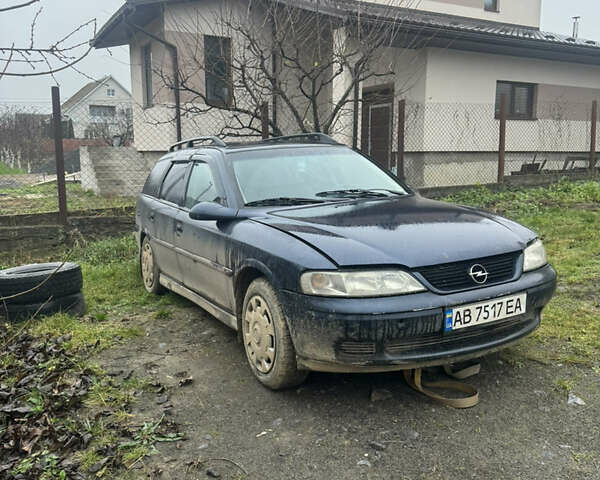 Синий Опель Вектра, объемом двигателя 1.8 л и пробегом 223 тыс. км за 750 $, фото 2 на Automoto.ua