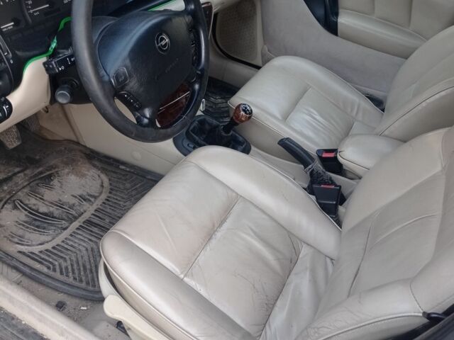 Синій Опель Вектра, об'ємом двигуна 2 л та пробігом 324 тис. км за 1700 $, фото 1 на Automoto.ua